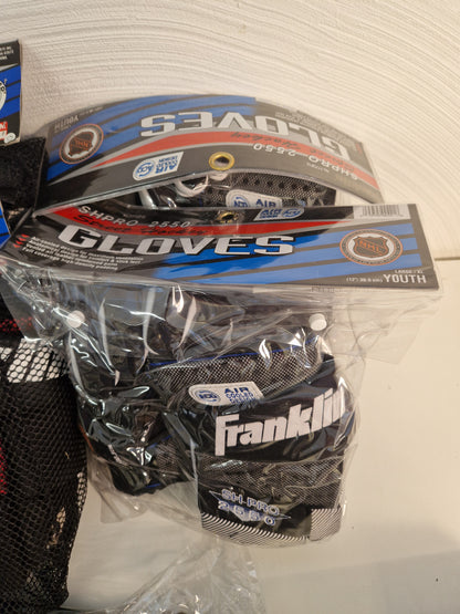 Franklin landhockeyhandskar + skidväska.