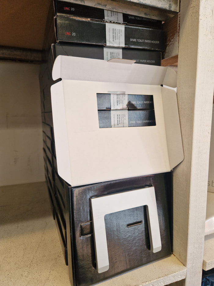 Toalettpappershållare